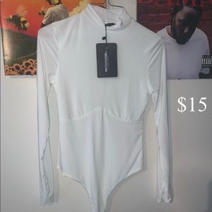 *NEVER WORN* LONG SLEEVE WHITE BODY SUIT